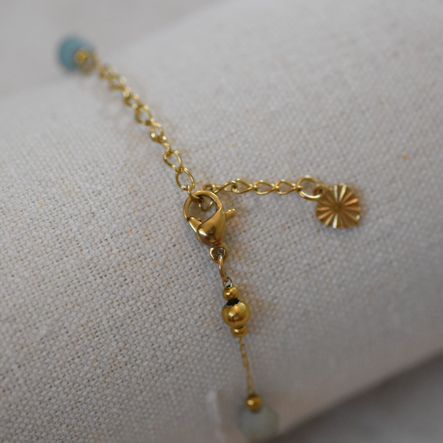 RVS armband Fleur lichtblauw goud