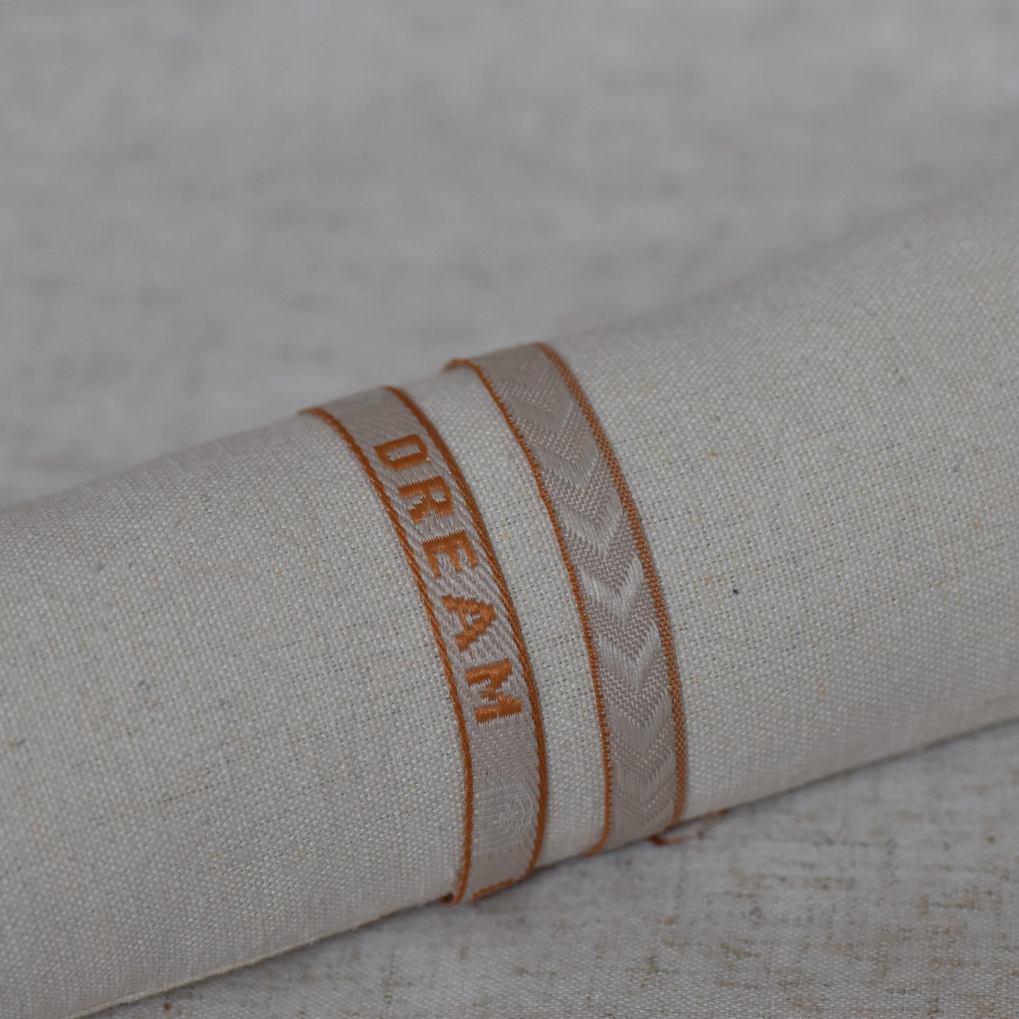 Lintarmband beige