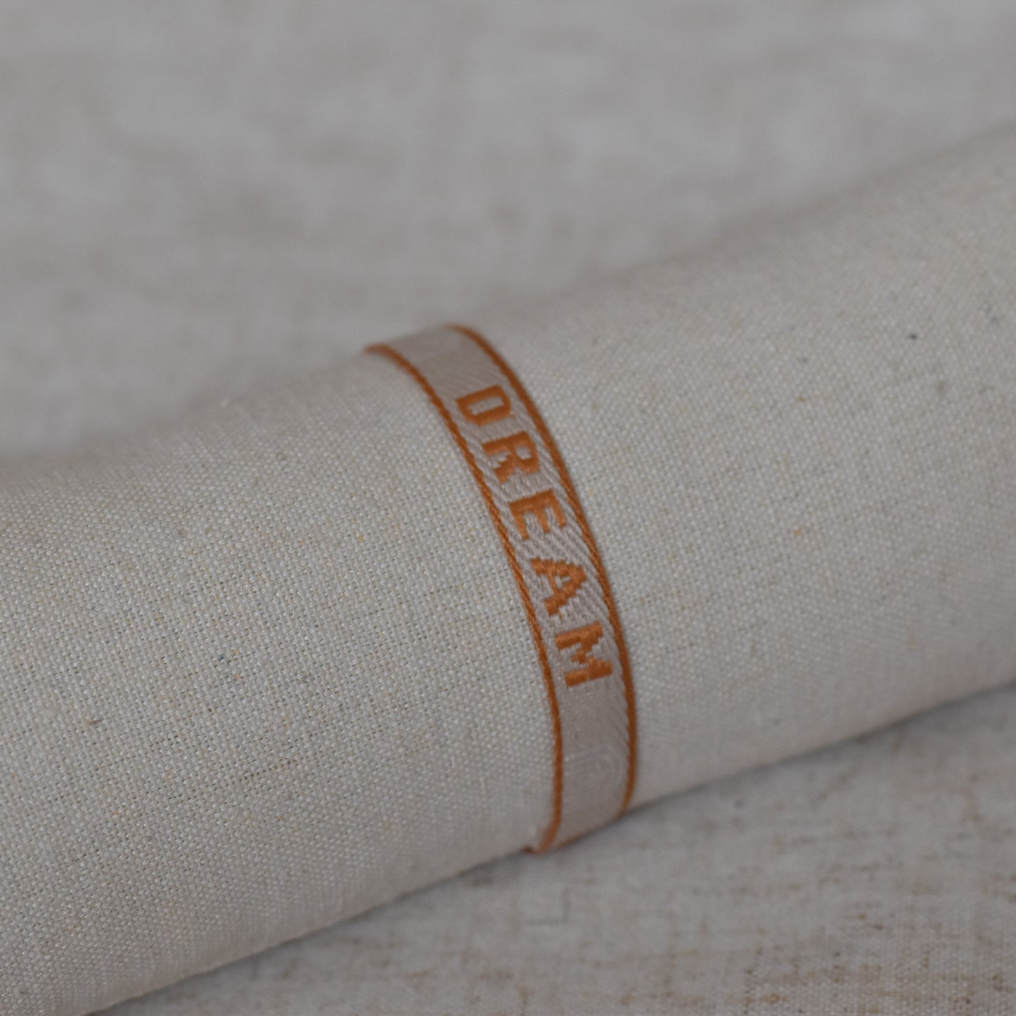 Lintarmband beige