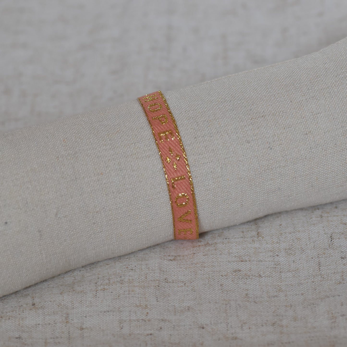 Lintarmband Faith, Hope, Love