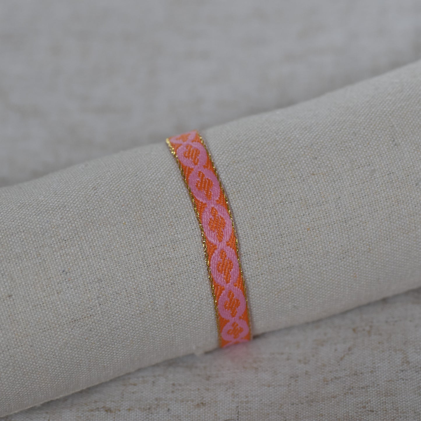 Lintarmband roze/oranje
