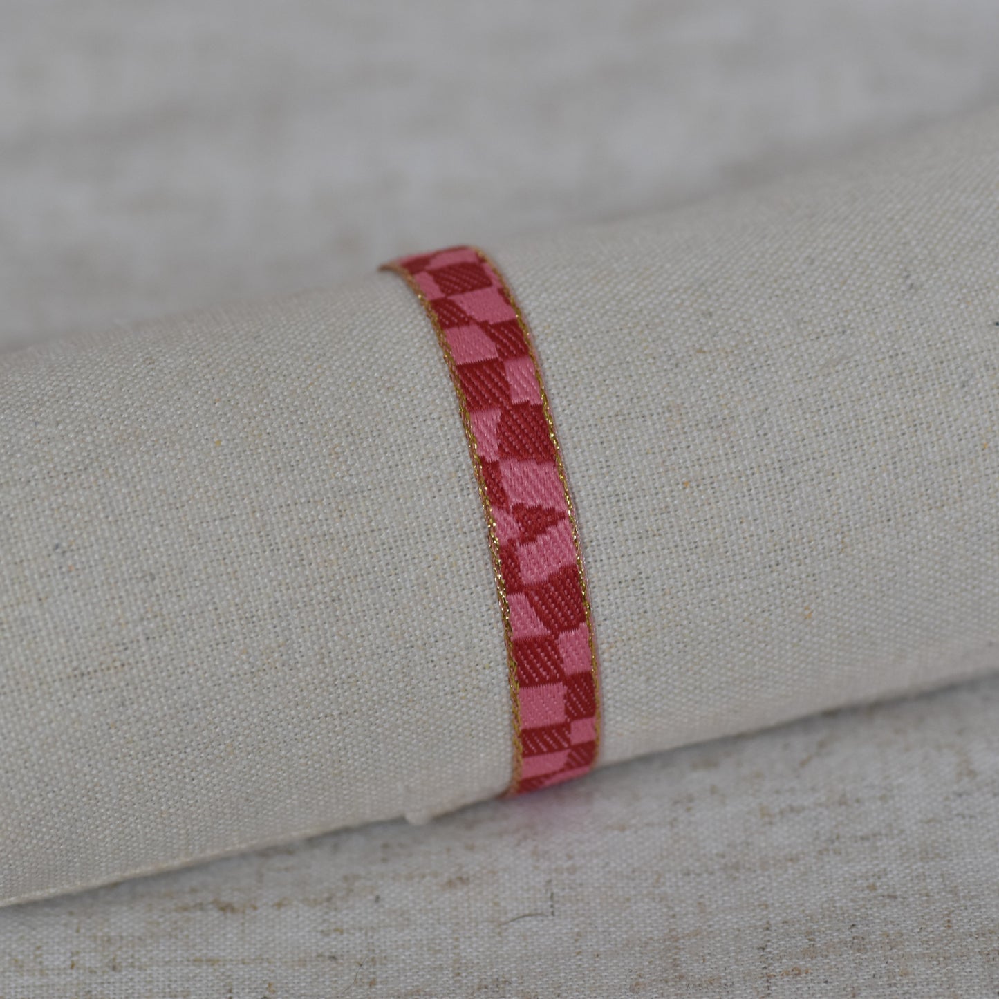 Lintarmband roze stukken