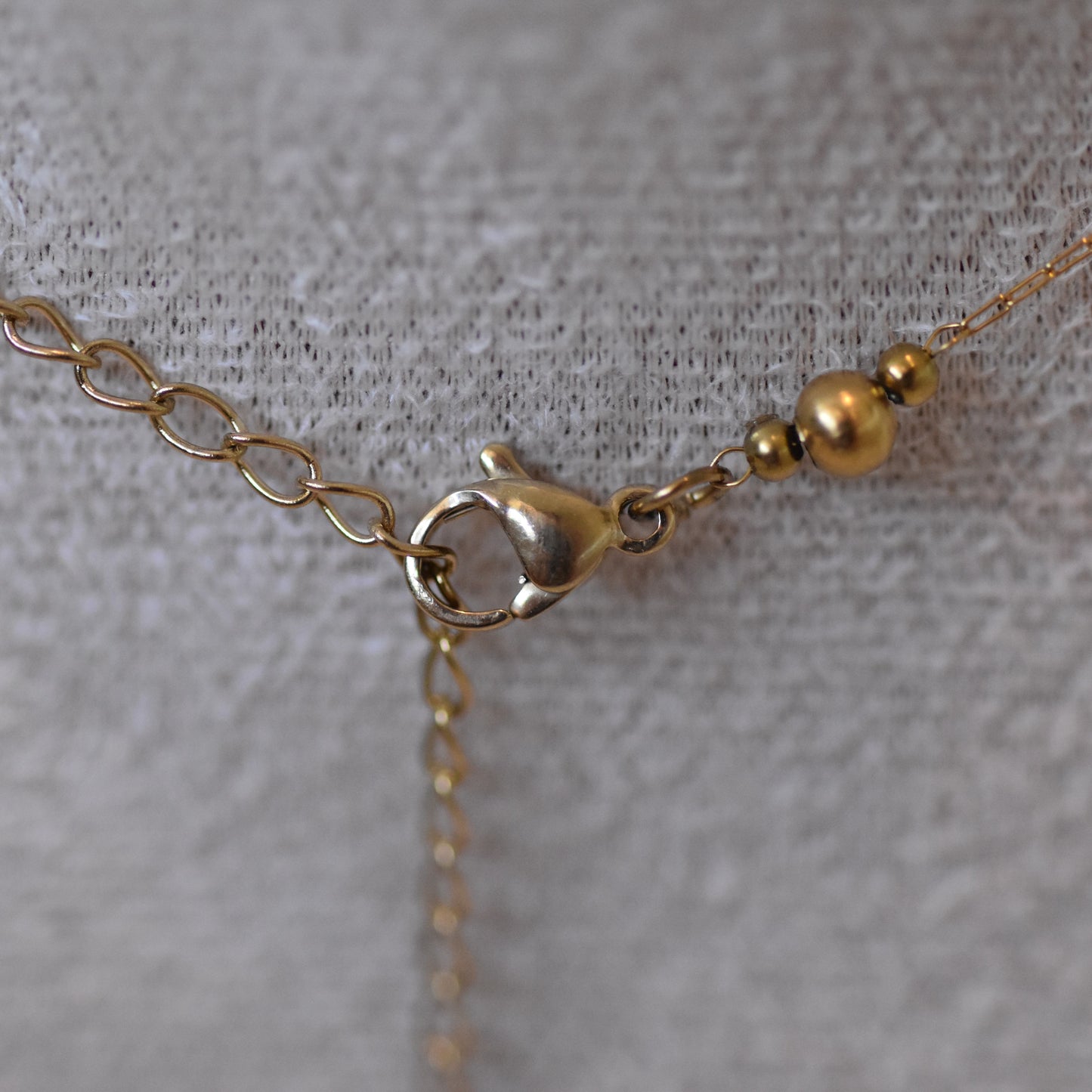 RVS ketting Fleur lichtblauw goud