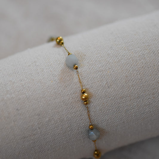 RVS armband Fleur lichtblauw goud